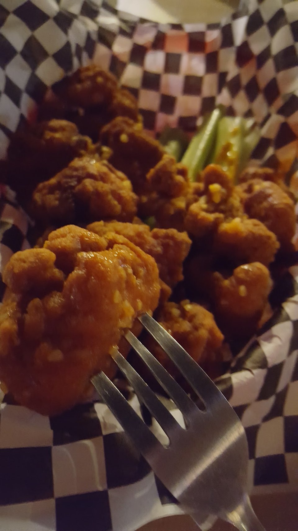 Simple bar menu with hearty burger selections.
