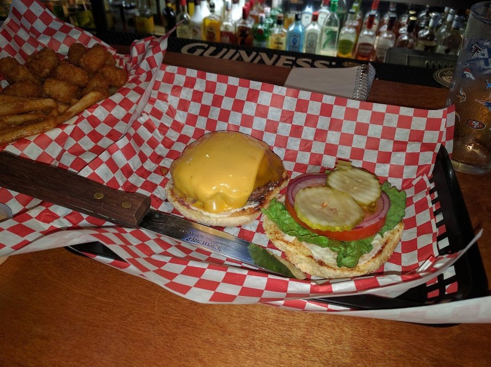Menu page featuring burger names and variations.